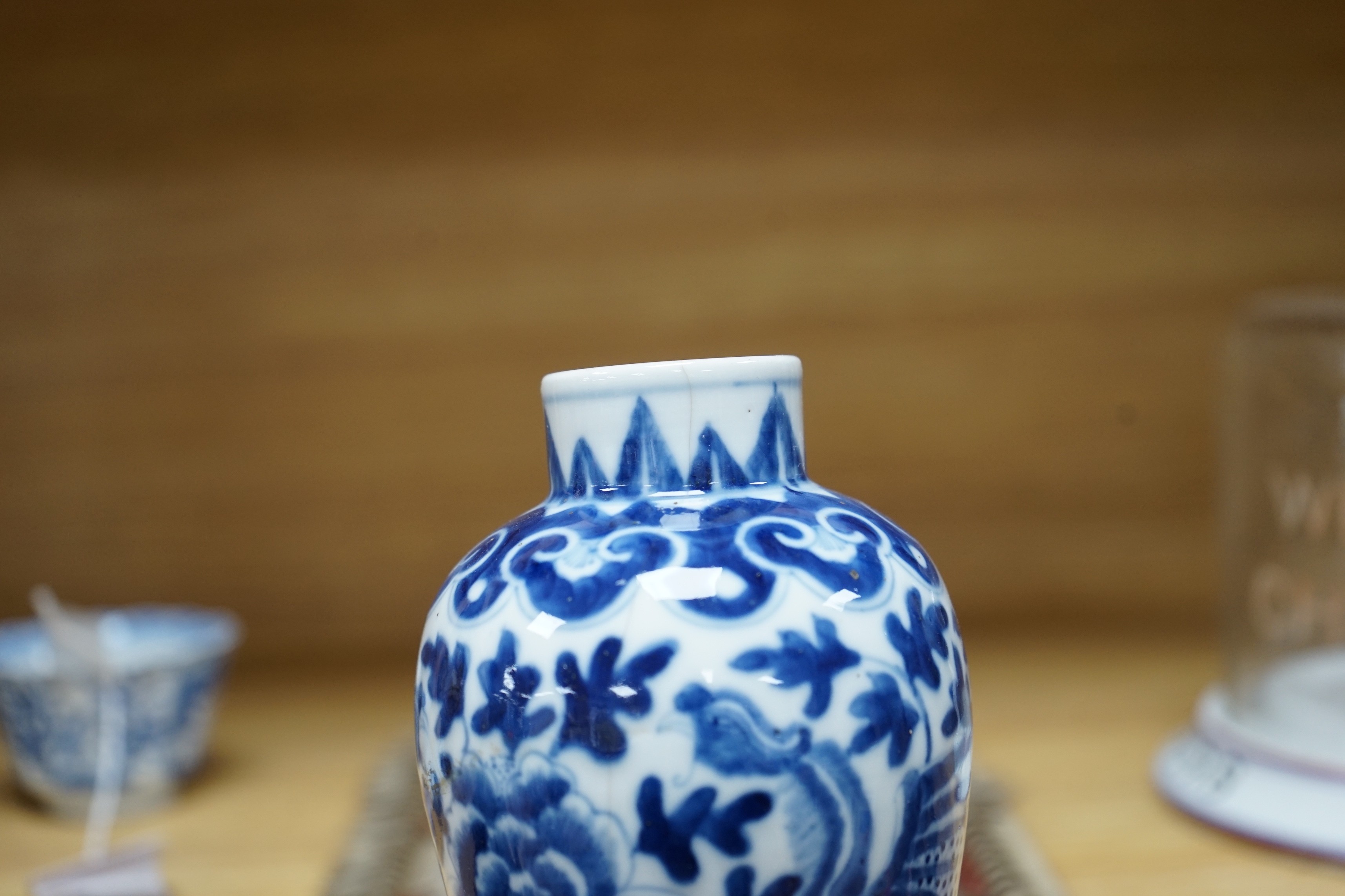 A Chinese blue and white phoenix decorated vase, a pair of circular boxes and a pair of damaged tea bowls. Late 19th century Tallest 17.5cm